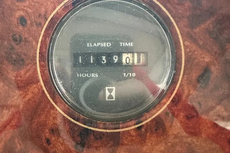 Slide: The Image of Hour meter showing 1390.1 hours on 1998 Maxum 3700 SCR boat. - 24