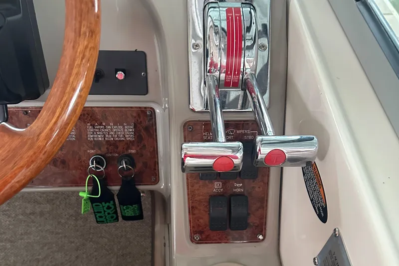 Slide: The Image of Close-up of 1998 Maxum 3700 SCR boat controls and steering wheel. - 28