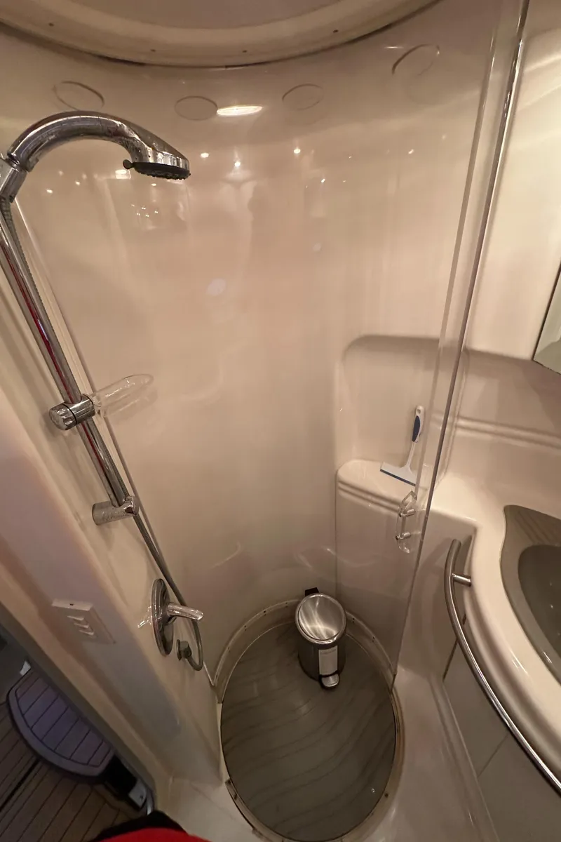 Slide: The Image of 1998 Maxum 3700 SCR yacht bathroom with shower and sink. - 36