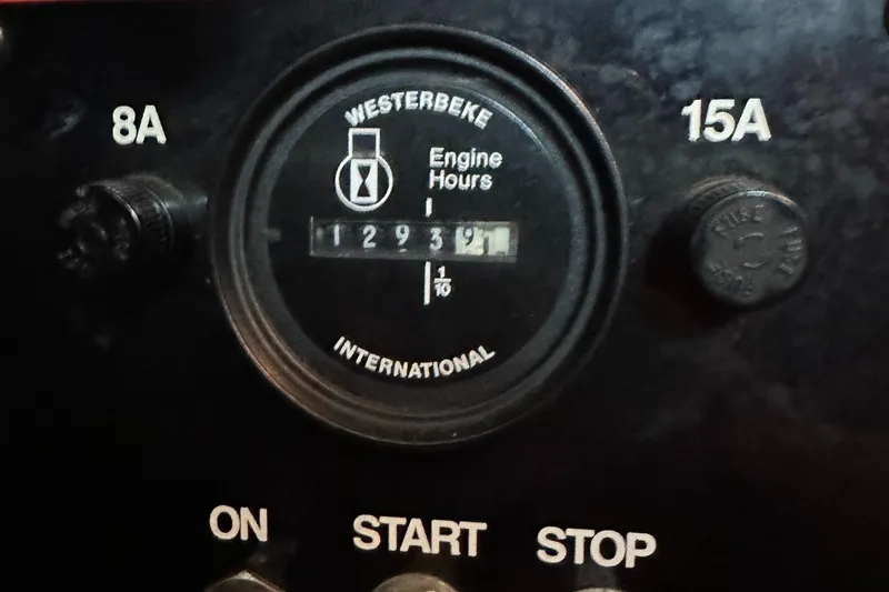 Slide: The Image of Westerbeke engine hour meter showing 1293.9 hours on a 1998 Maxum 3700 SCR. - 43