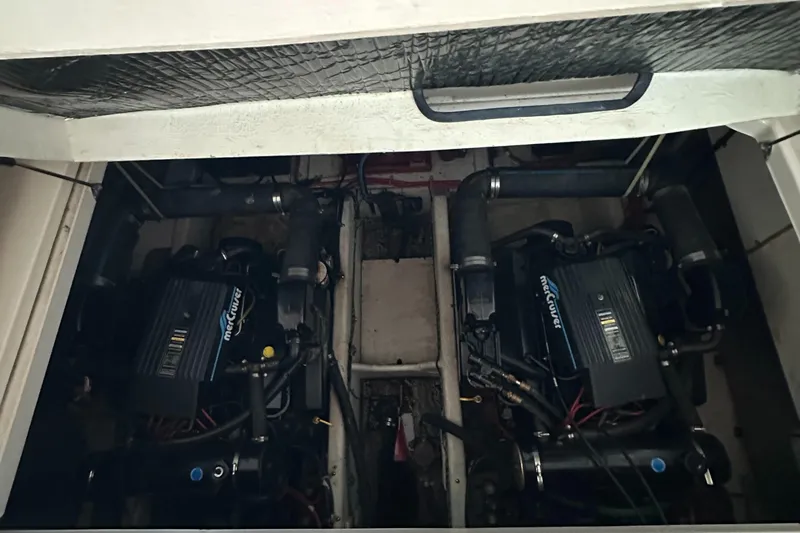 Slide: The Image of Engine compartment of a 1998 Maxum 3700 SCR with dual MerCruiser engines. - 46