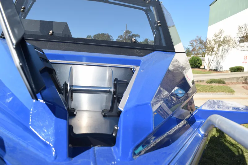 Slide: The Image of 2024 Stabicraft 1850 Fisher Sportfish boat, blue exterior, close-up view of bow area. - 17