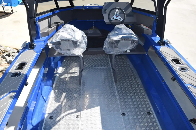 Slide: The Image of 2024 Stabicraft 1850 Fisher Sportfish interior with dual seats and steering wheel. - 5