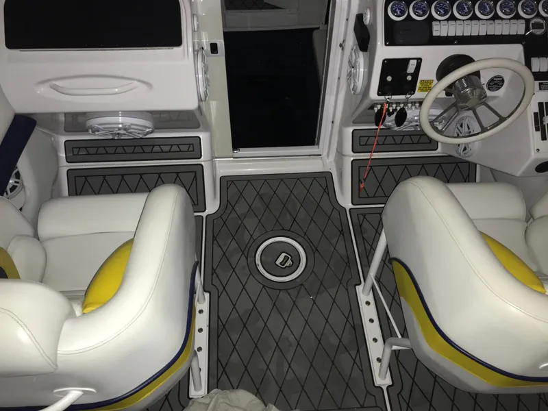 Slide: The Image of 2007 Donzi 28 ZX Open boat interior with dual seats and modern dashboard. - 20
