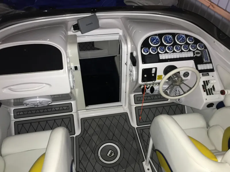 Slide: The Image of 2007 Donzi 28 ZX Open cockpit with modern controls and seating. - 21
