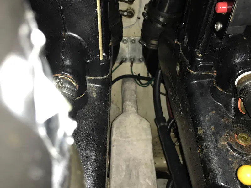 Slide: The Image of Engine compartment of a 2007 Donzi 28 ZX Open boat, showing mechanical components. - 26