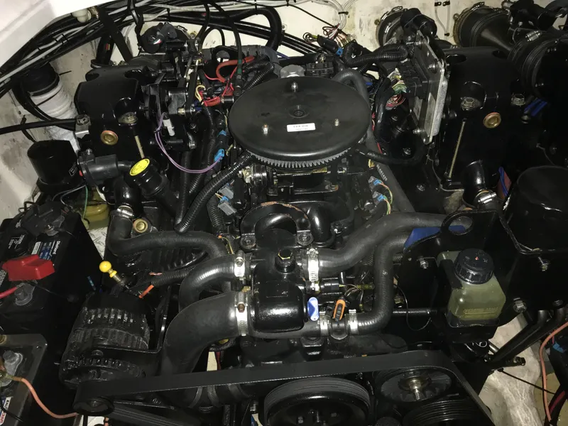 Slide: The Image of Engine of 2007 Donzi 28 ZX Open boat, showcasing intricate components and wiring. - 27