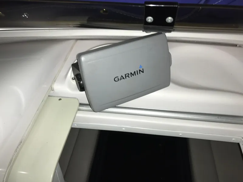 Slide: The Image of Garmin device mounted on 2007 Donzi 28 ZX Open boat interior. - 29