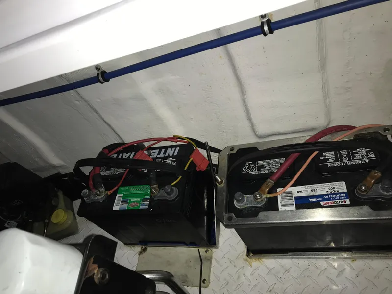 Slide: The Image of Batteries in a 2007 Donzi 28 ZX Open boat engine compartment. - 30