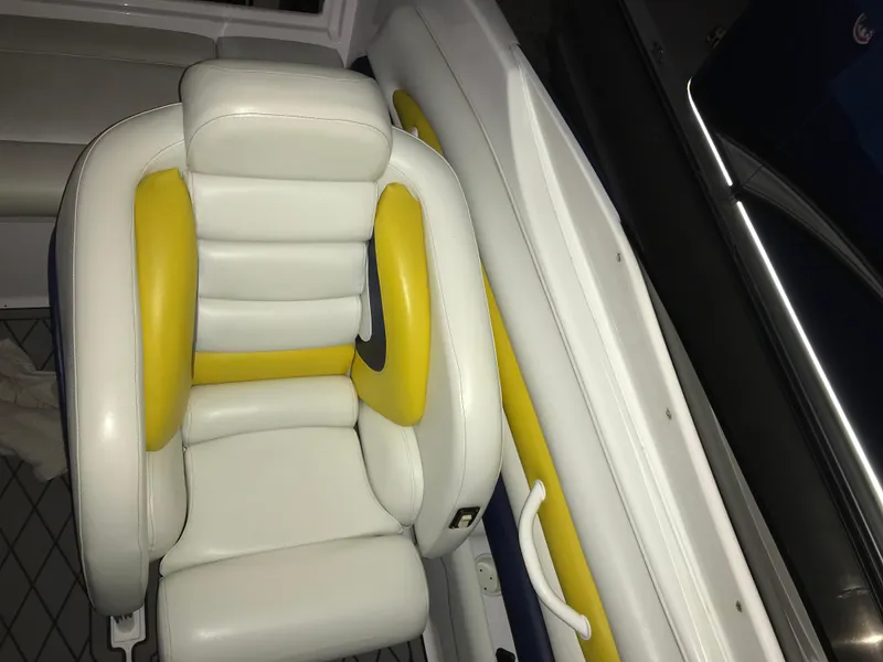 Slide: The Image of 2007 Donzi 28 ZX Open boat seat with white and yellow upholstery. - 35