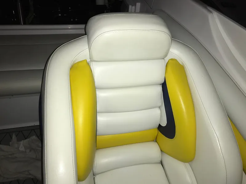 Slide: The Image of 2007 Donzi 28 ZX Open boat seat with white and yellow upholstery. - 36