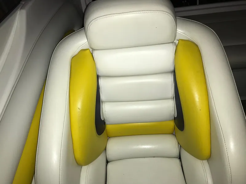 Slide: The Image of 2007 Donzi 28 ZX Open boat seat with white and yellow upholstery. - 38
