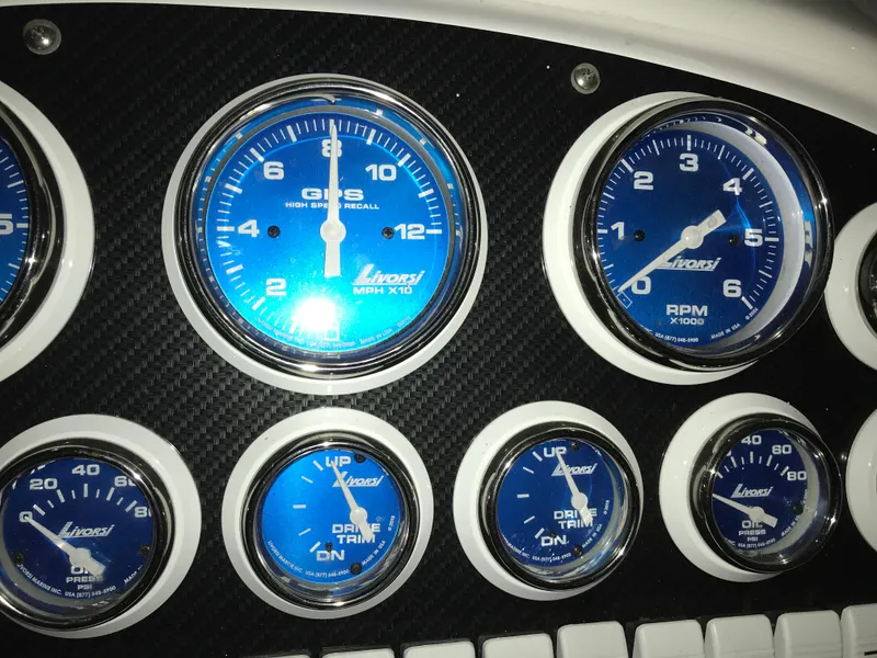 Slide: The Image of Dashboard of 2007 Donzi 28 ZX Open with blue Livorsi gauges. - 40