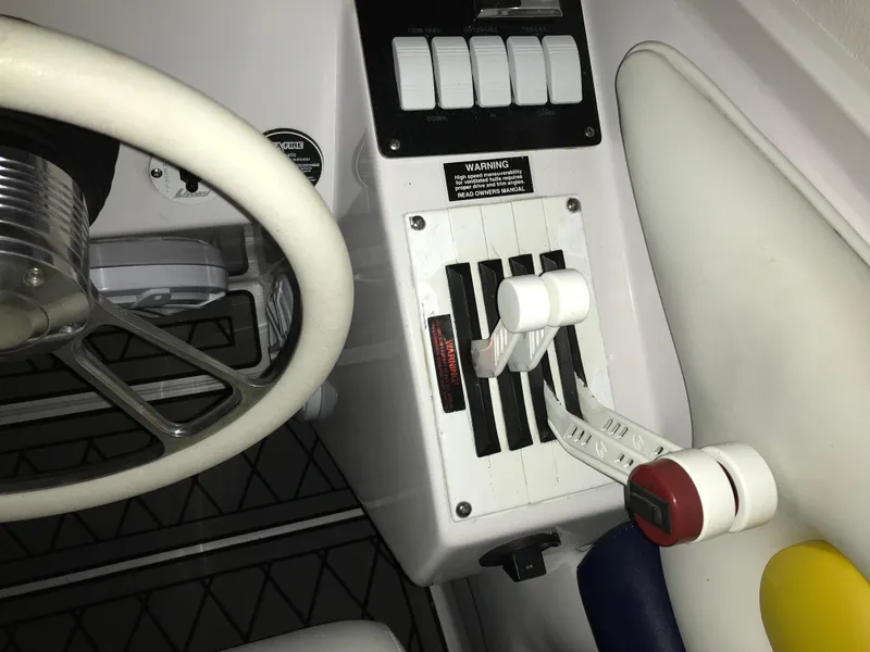 Slide: The Image of 2007 Donzi 28 ZX Open boat controls and steering wheel close-up. - 41