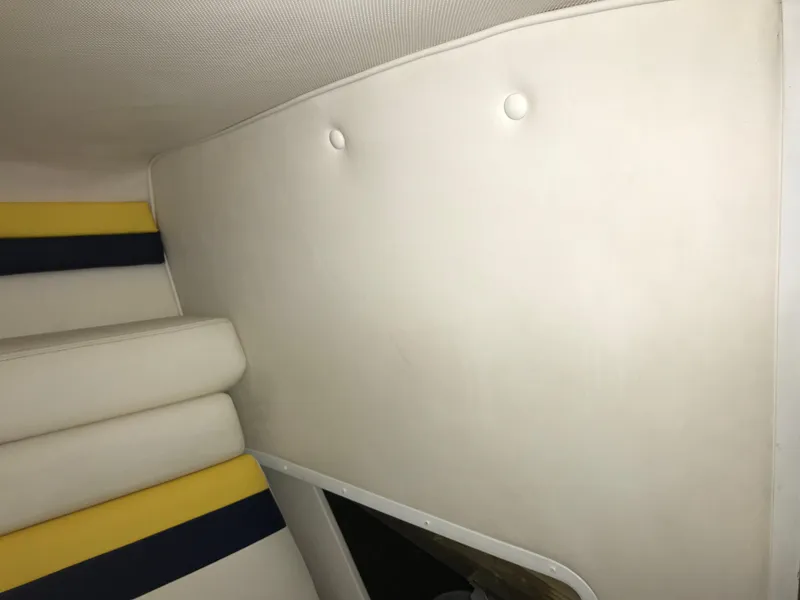 Slide: The Image of Interior of 2007 Donzi 28 ZX Open boat with white and yellow upholstery. - 45