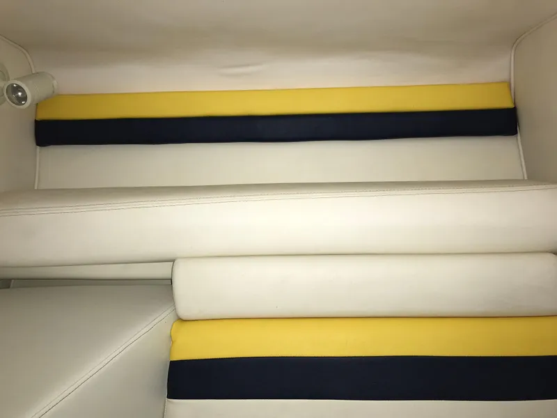 Slide: The Image of Interior seating of 2007 Donzi 28 ZX Open with yellow and navy accents. - 47