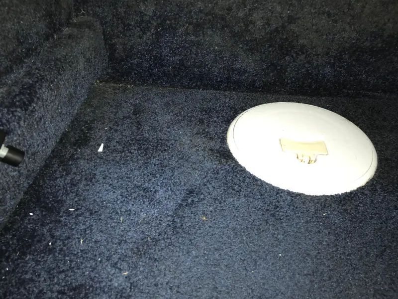 Slide: The Image of Interior carpet of 2007 Donzi 28 ZX Open boat with circular hatch. - 49