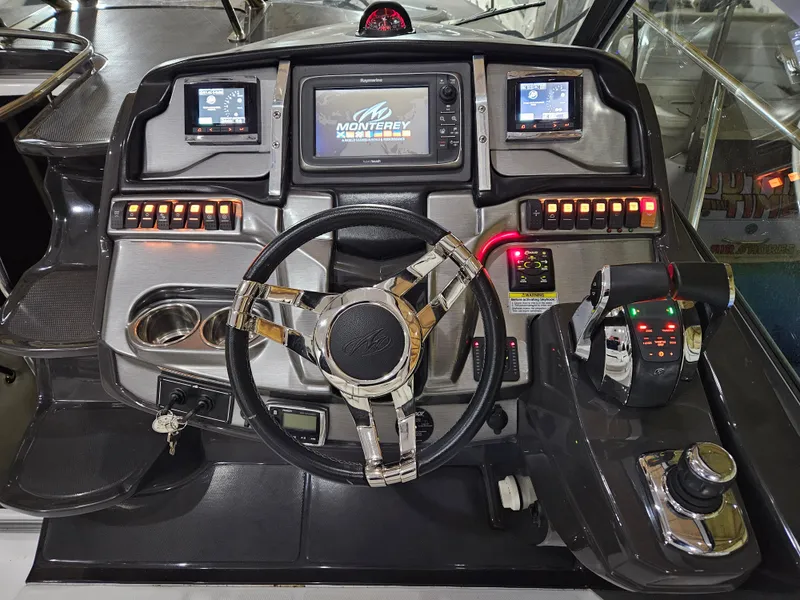 Slide: The Image of Interior of a 2016 Monterey 355 Sport Yacht with white seating and modern design. - 10