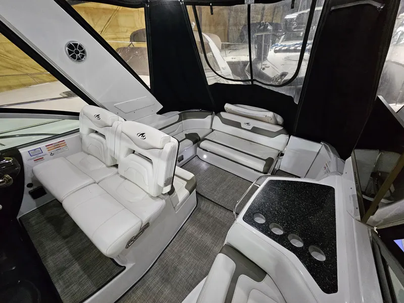 Slide: The Image of 2016 Monterey 355 Sport Yacht docked at marina, viewed from bow. - 7