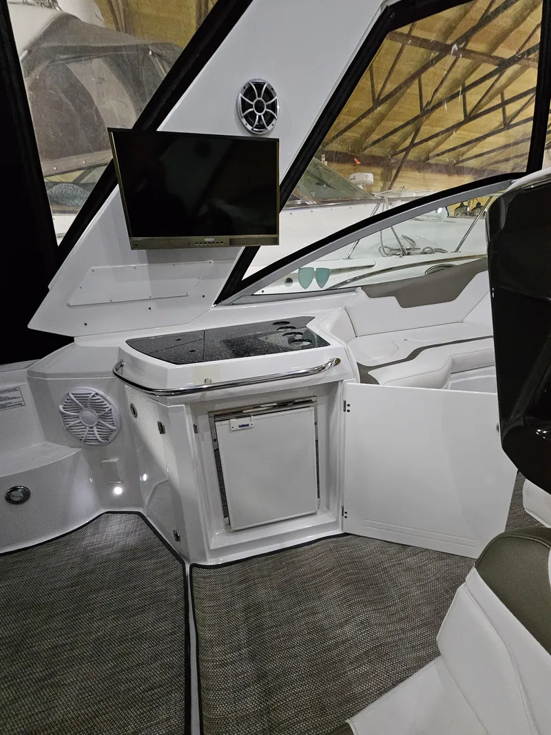 Slide: The Image of 2016 Monterey 355 Sport Yacht interior with luxurious seating and modern design. - 8