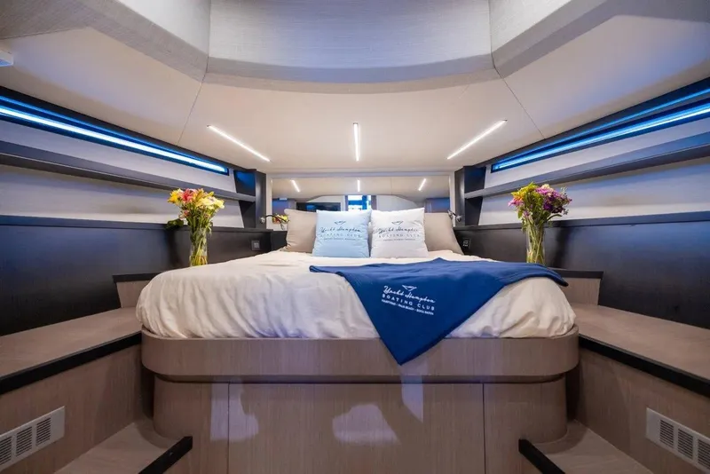Slide: The Image of Luxurious 2023 OKEAN 57 yacht bedroom with modern design and elegant decor. - 7