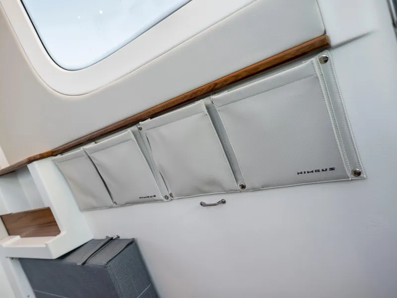 Slide: The Image of Interior storage pockets in 2025 Nimbus C11 boat, featuring sleek design and functionality. - 34