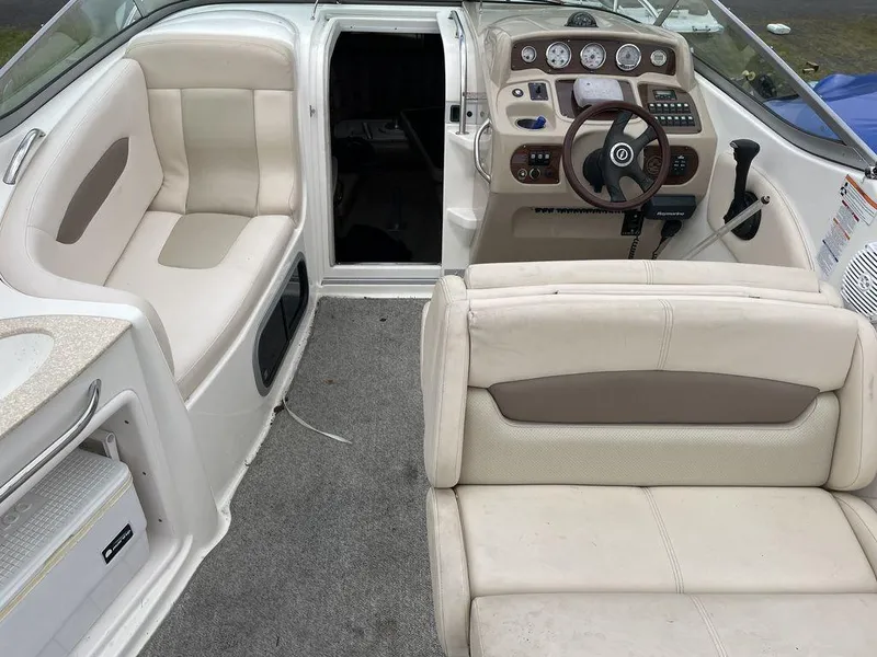 Slide: The Image of 2007 Chaparral 250 Signature boat interior with seating and dashboard. - 16