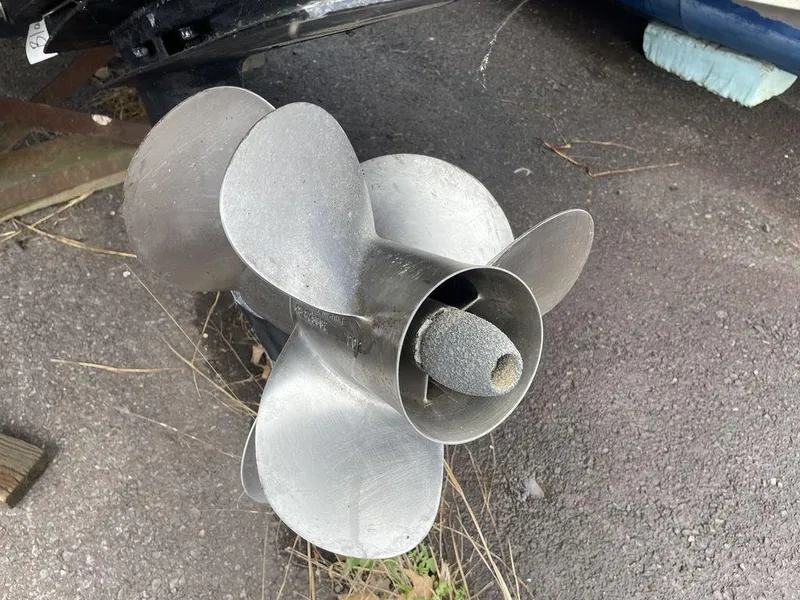 Slide: The Image of Propeller of 2007 Chaparral 250 Signature boat on asphalt surface. - 19