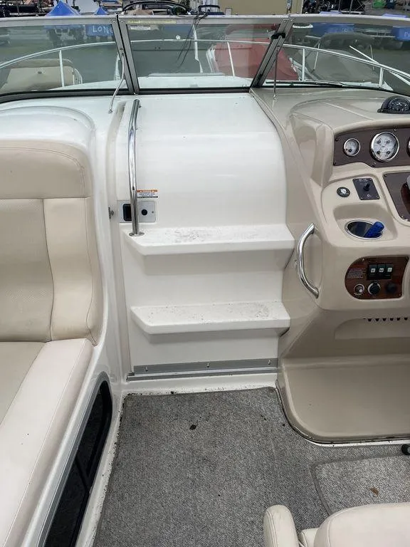 Slide: The Image of 2007 Chaparral 250 Signature boat interior with helm and seating area. - 4
