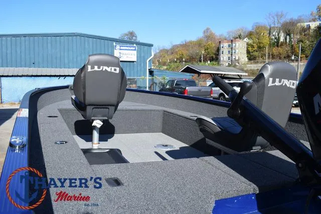 Slide: The Image of 2024 Lund 1650 Angler Tiller boat interior with seats at Thayer's Marine. - 10