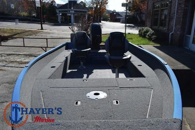 Slide: The Image of 2024 Lund 1650 Angler Tiller boat with dual seats, showcased at Thayer's Marine. - 11