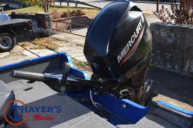 Slide: The Image of 2024 Lund 1650 Angler Tiller with Mercury outboard motor, showcased at Thayer's Marine. - 21