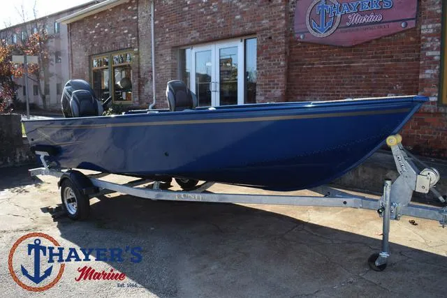 Slide: The Image of 2024 Lund 1650 Angler Tiller boat on trailer at Thayer's Marine. - 25
