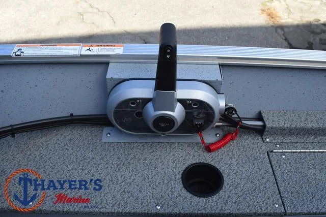 Slide: The Image of 2024 Lund 1600 Fury SS boat control panel with throttle lever. - 17