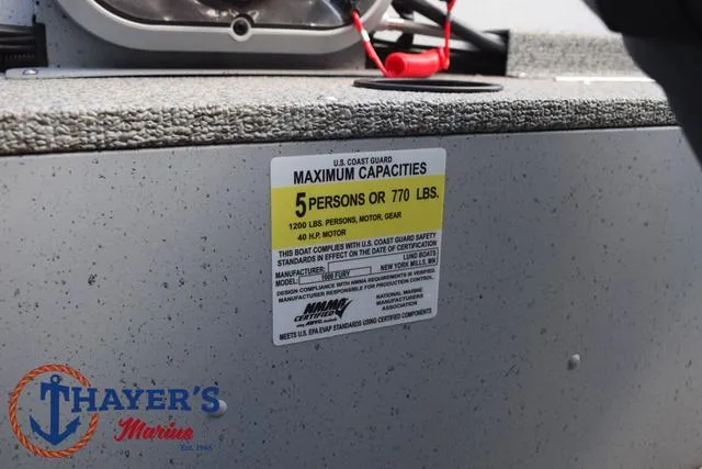 Slide: The Image of 2024 Lund 1600 Fury SS boat capacity label, maximum 5 persons or 770 lbs. - 18