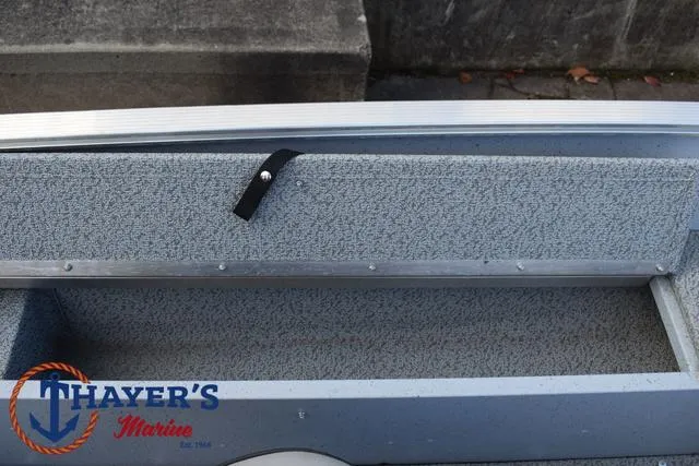 Slide: The Image of 2024 Lund 1600 Fury SS boat interior with Thayer's Marine logo. - 20