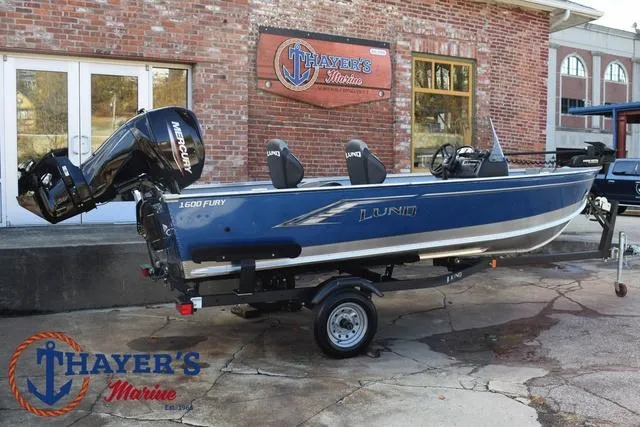 Slide: The Image of 2024 Lund 1600 Fury SS boat on trailer at Thayer's Marine. - 29