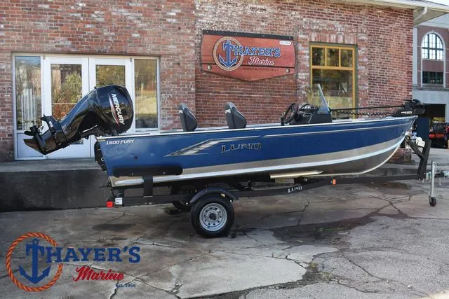 Slide: The Image of 2024 Lund 1600 Fury SS boat displayed at Thayer's Marine dealership. - 3