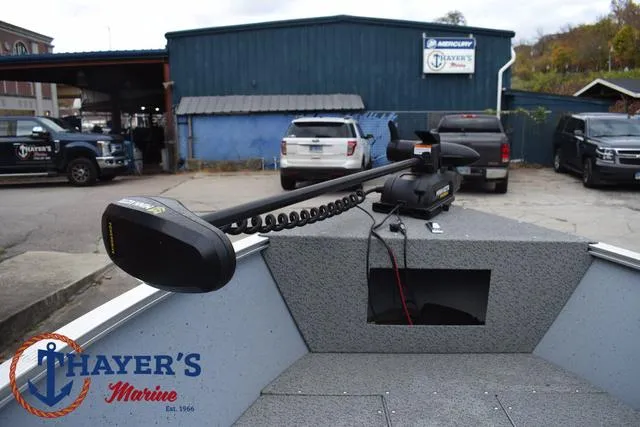 Slide: The Image of 2024 Lund 1600 Fury SS boat with trolling motor at Thayer's Marine dealership. - 12