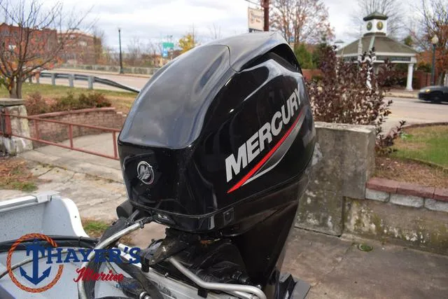 Slide: The Image of 2024 Lund 1600 Fury SS with Mercury outboard motor in outdoor setting. - 20