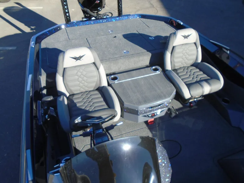 Slide: The Image of 2025 Vexus VX21 boat interior with two cushioned seats and a central console. - 17