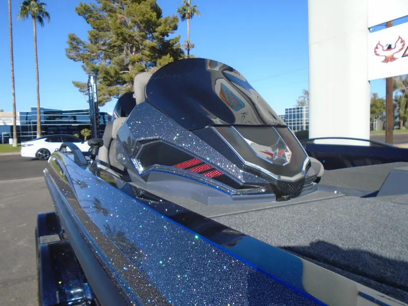 Slide: The Image of 2025 Vexus VX21 boat with sleek design and modern features, parked outdoors. - 22