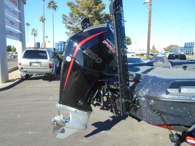 Slide: The Image of 2025 Vexus VX21 boat with powerful 250 horsepower engine, parked outdoors. - 7