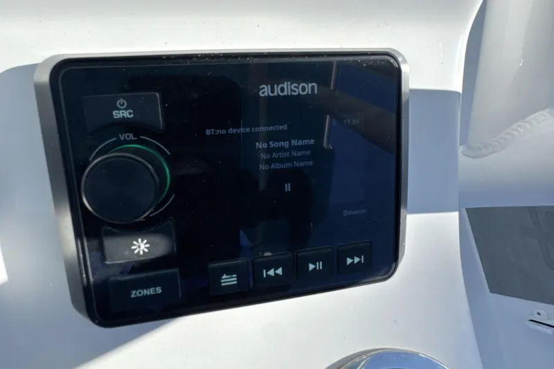 Slide: The Image of Audison audio system on 2023 Sea Pro 228 Bay boat dashboard. - 16