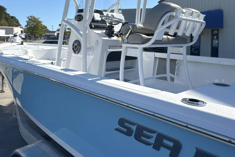 Slide: The Image of 2023 Sea Pro 228 Bay boat with sleek design and comfortable seating. - 19