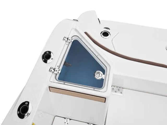 Slide: The Image of 2025 Yamaha Boats 222 FSH Sport E deck detail with storage compartment. - 13