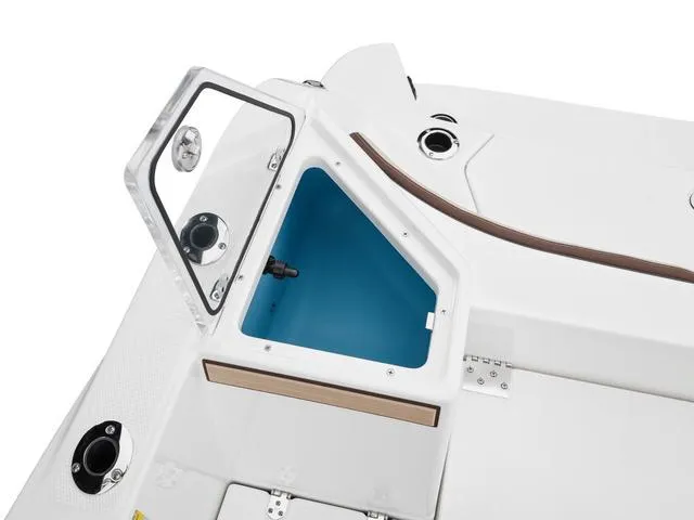 Slide: The Image of 2025 Yamaha Boats 222 FSH Sport E storage compartment with open hatch. - 14