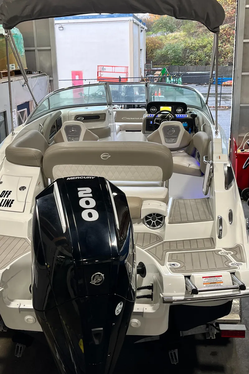 Slide: The Image of 2023 Crownline Eclipse E235 XS boat with Mercury 200 engine, interior view. - 21