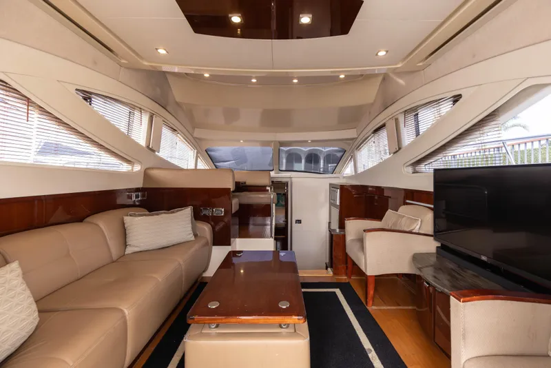 Slide: The Image of Luxurious interior of 2012 Sea Ray 450 Sedan yacht with elegant seating and modern design. - 12