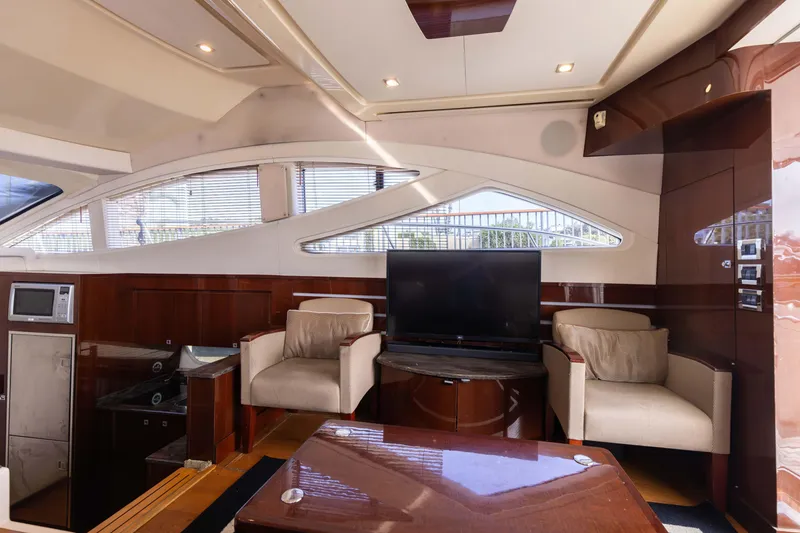 Slide: The Image of Luxurious interior of 2012 Sea Ray 450 Sedan yacht with modern furnishings. - 13